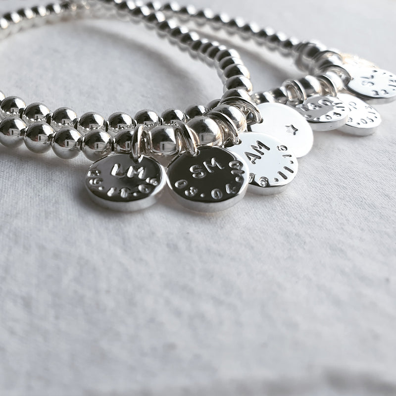 Naos Sterling Silver Bracelet with Personalised Discs & Elastic Finish